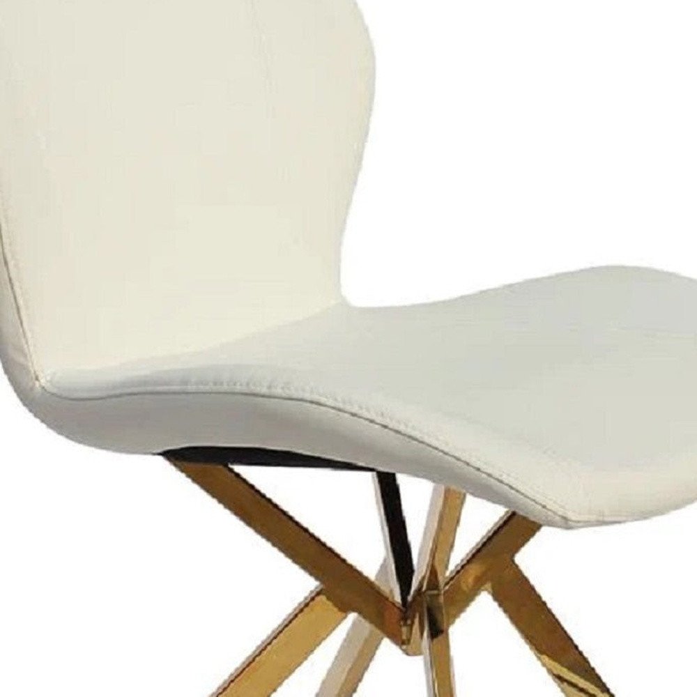 Set of Four White and Gold Faux Leather Dining Side Chairs