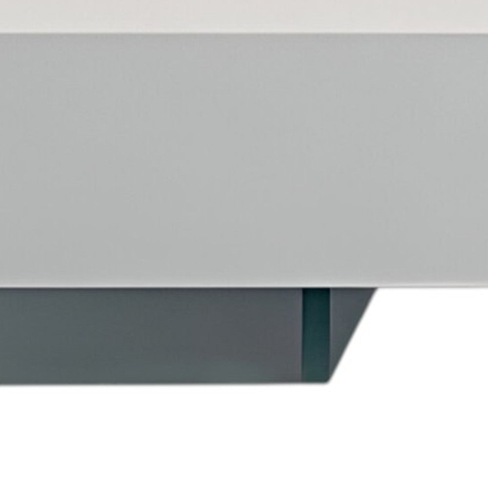 53" White And Clear Wood And Glass Sled Coffee Table