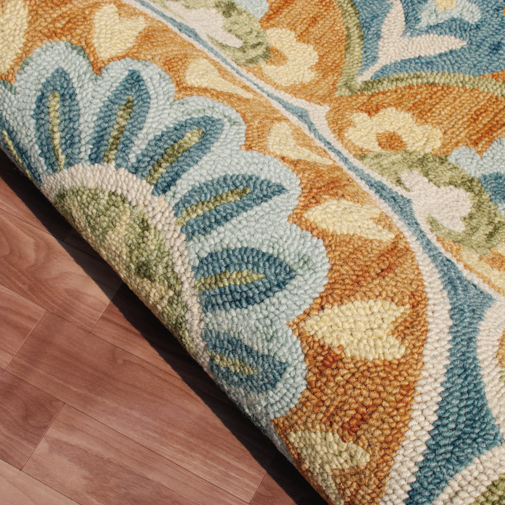 6' Orange and Blue Round Wool Floral Hand Tufted Area Rug