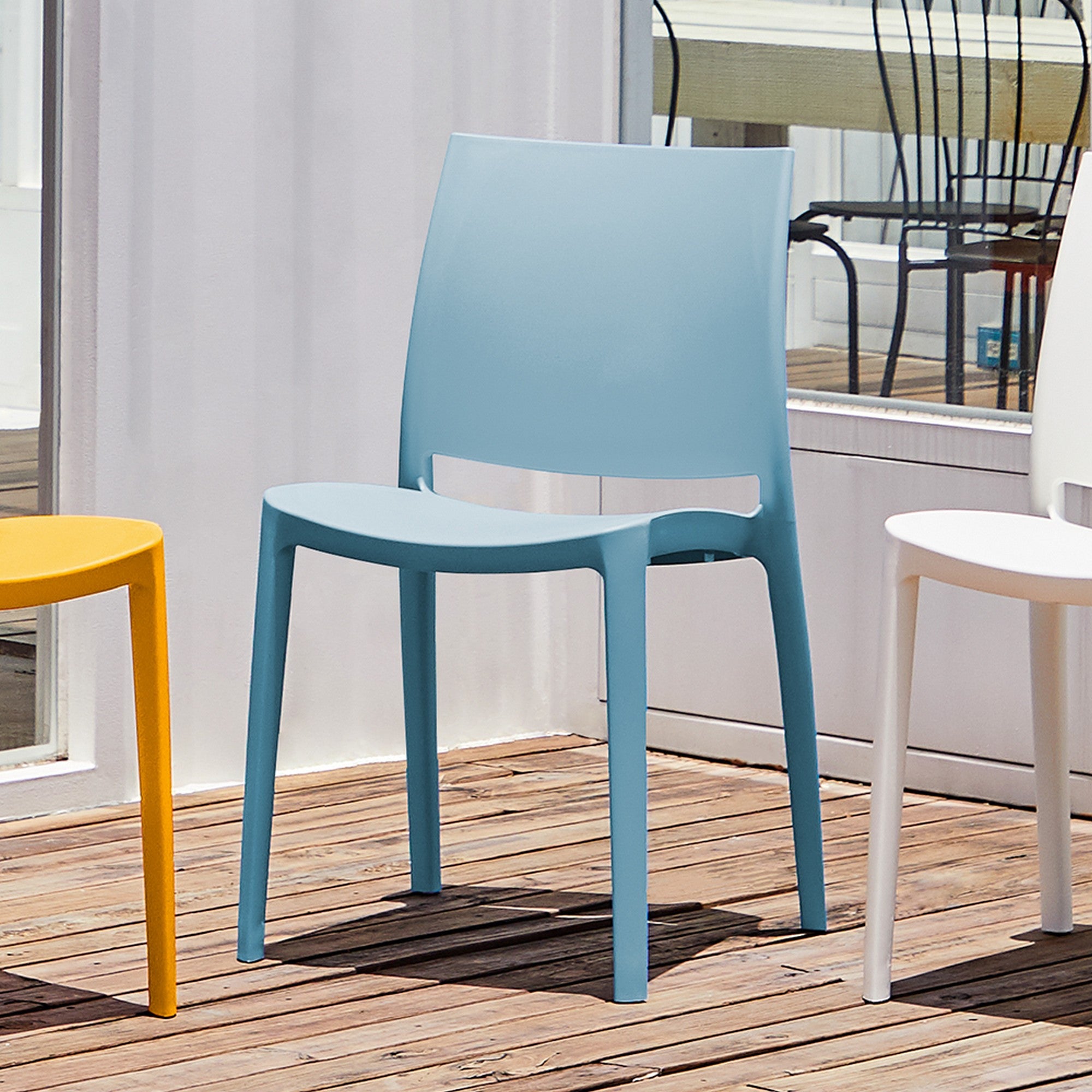 Set of Four Baby Blue Heavy Duty Plastic Outdoor Stacking Dining Chairs
