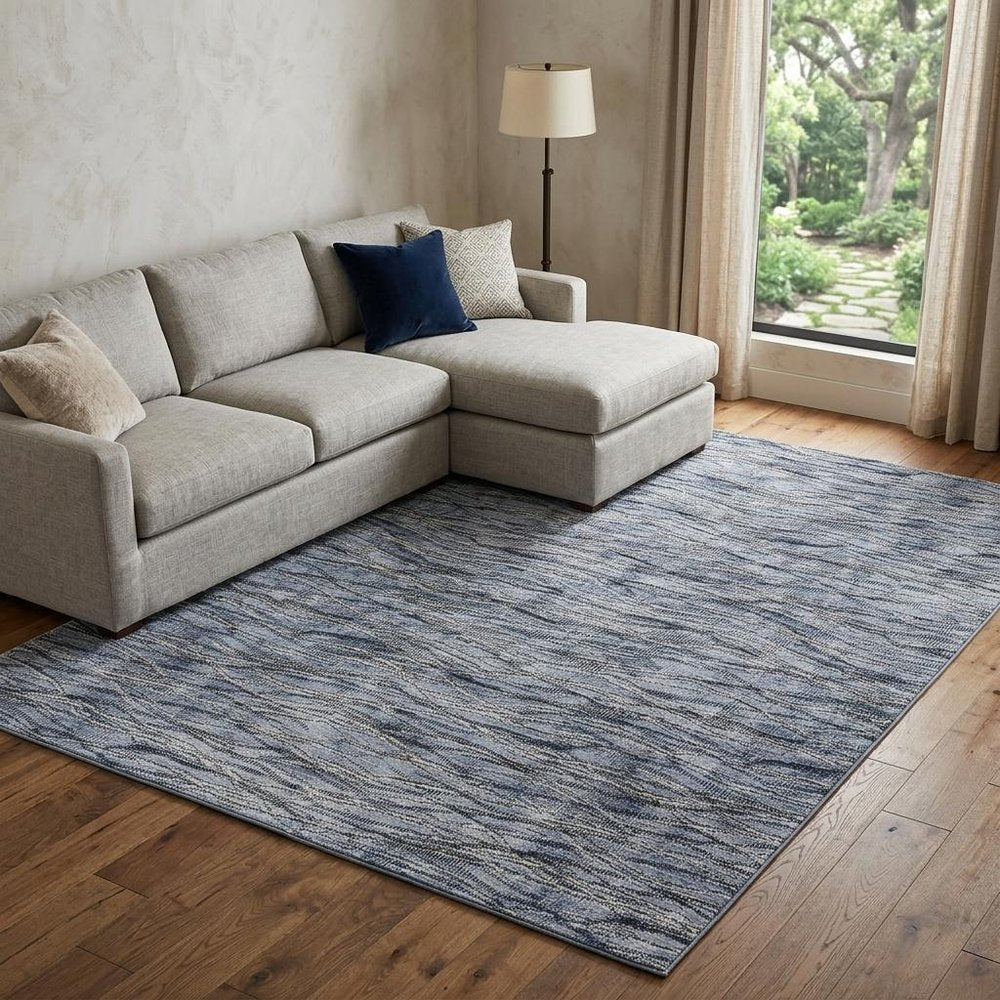 9' X 13' Blue Ivory and Tan Abstract Power Loom Area Rug
