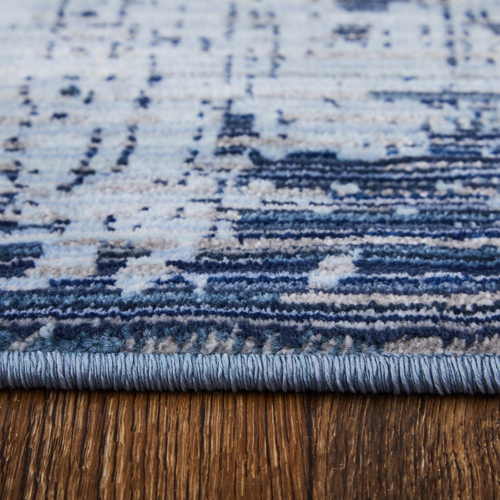 9' X 13' Light Blue and Black Abstract Power Loom Area Rug