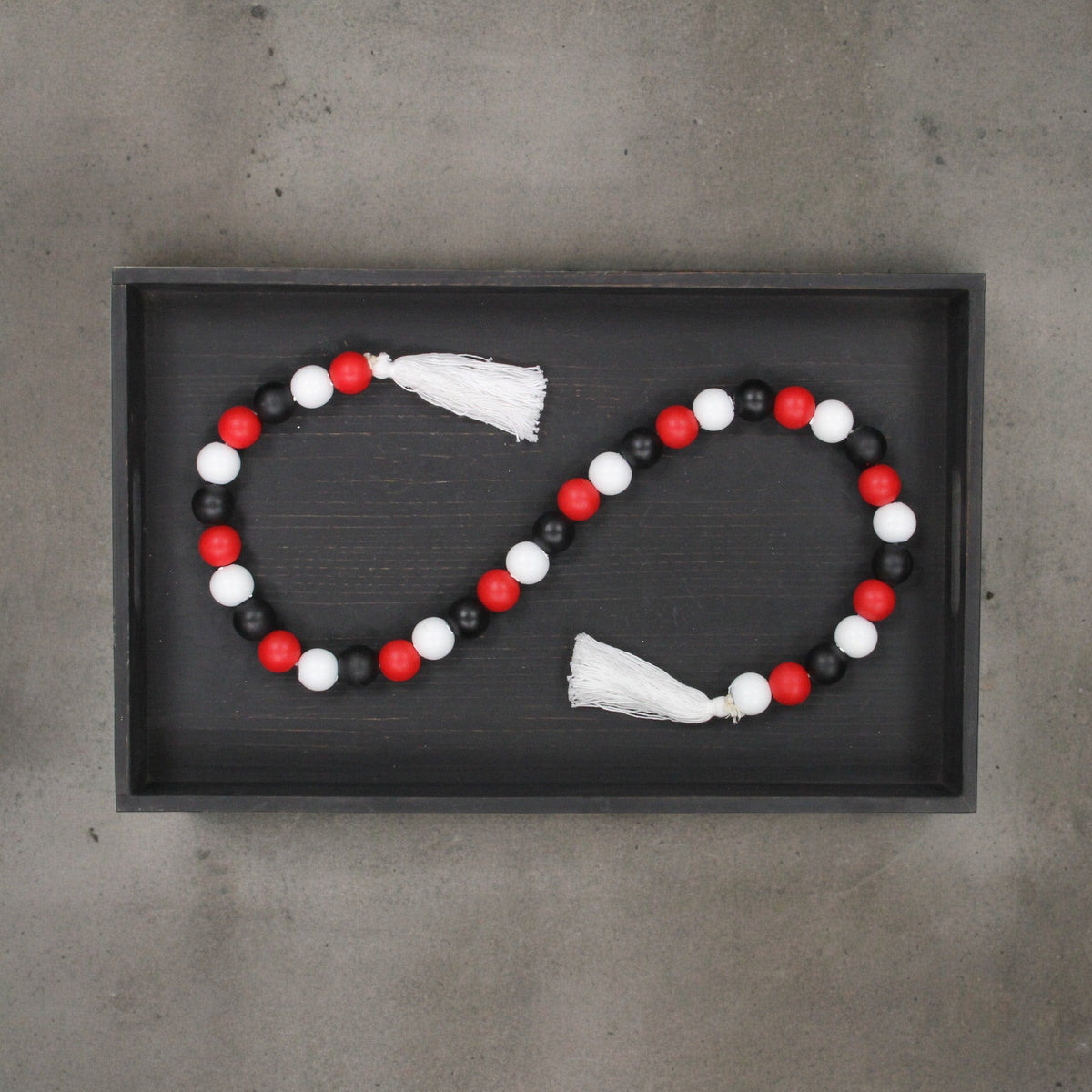 40" Black Red And White Wood Hand Painted Decorative Tassel