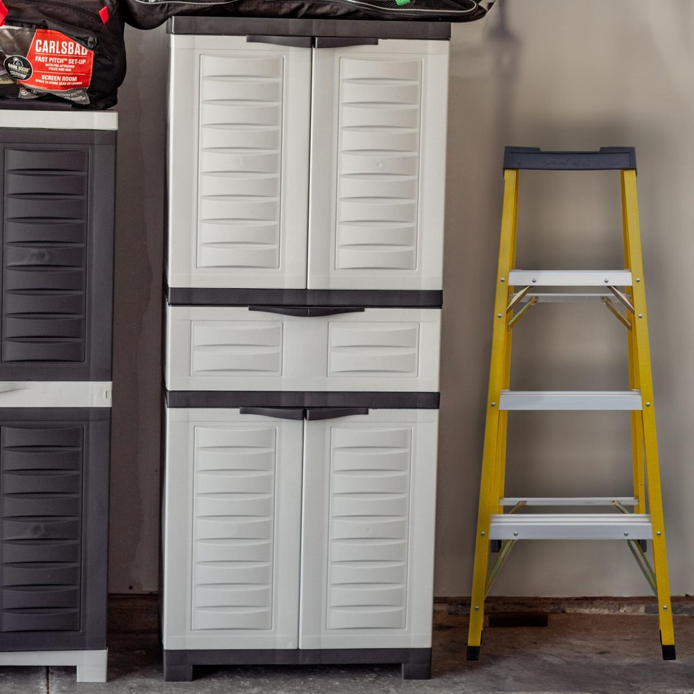 23" Black and Gray Plastic Accent Cabinet With Four Doors And One Drawer