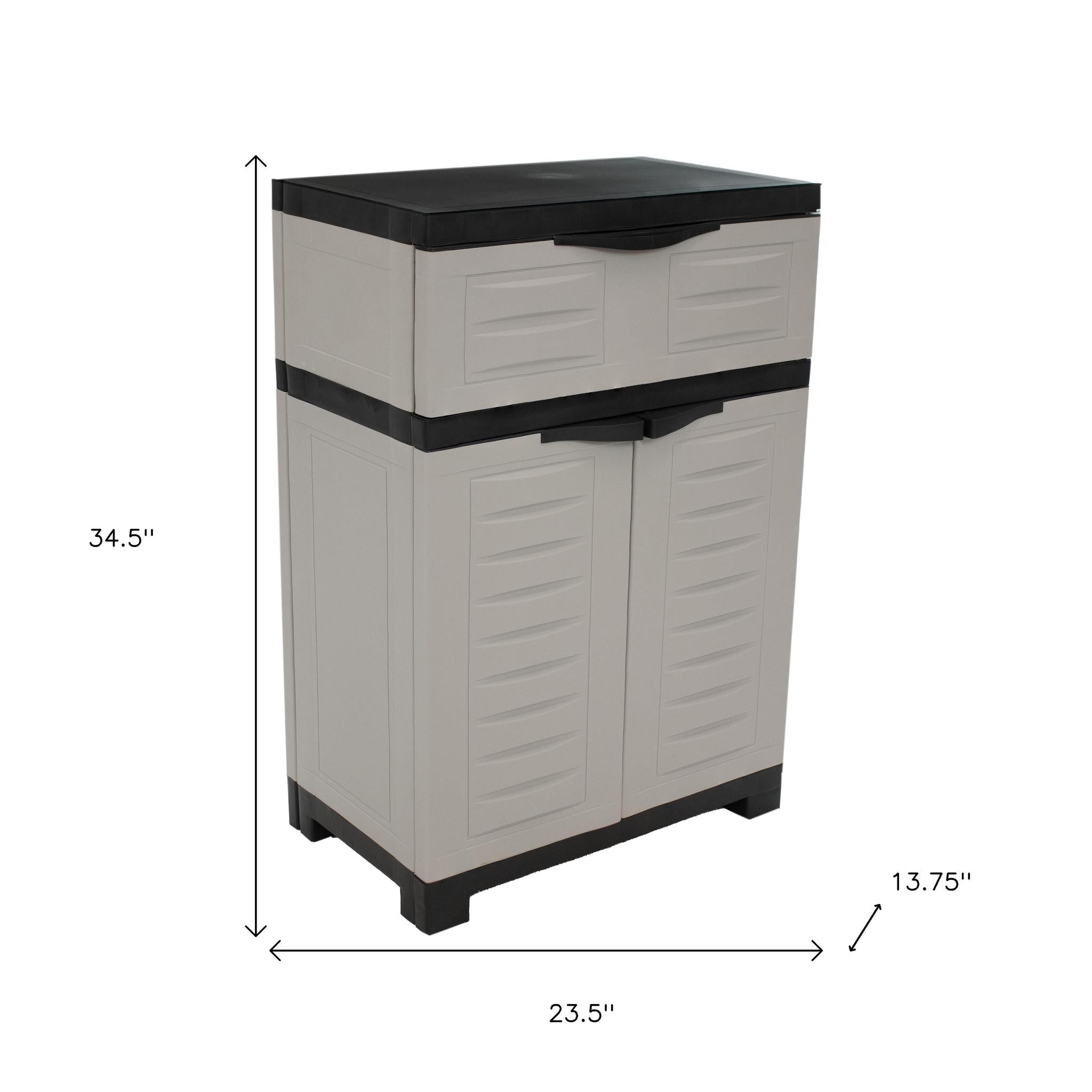 24" Gray Plastic Accent Cabinet With Two Doors And One Drawer