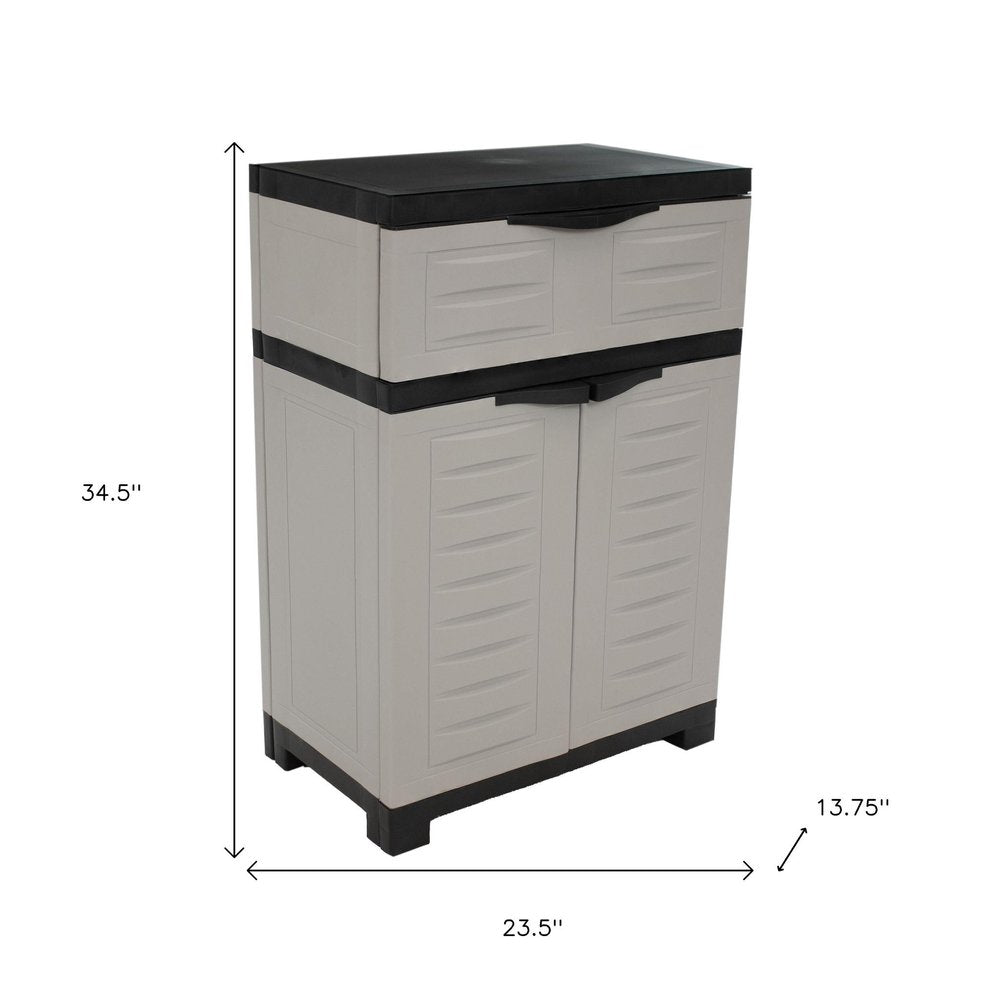 24" Gray Plastic Accent Cabinet With Two Doors And One Drawer
