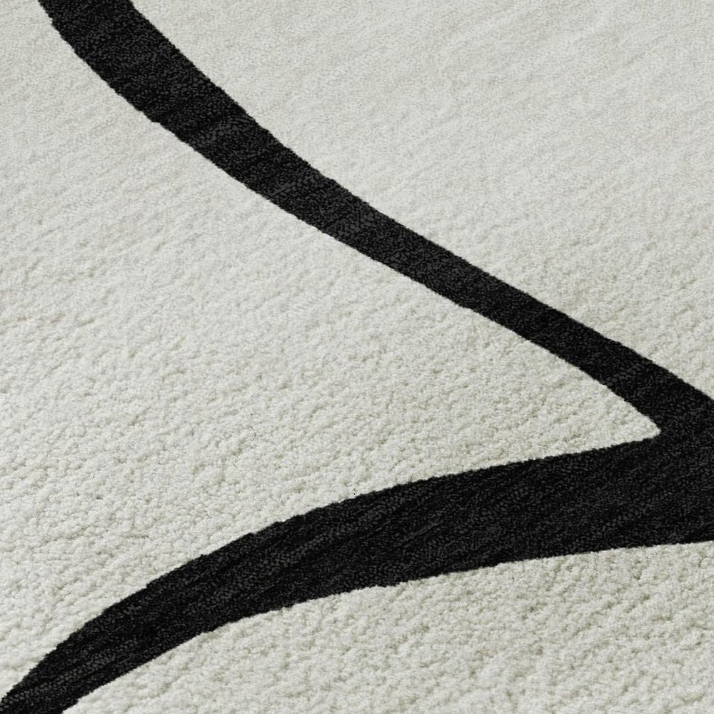 9' X 12' White And Black Abstract Washable Area Rug With UV Protection