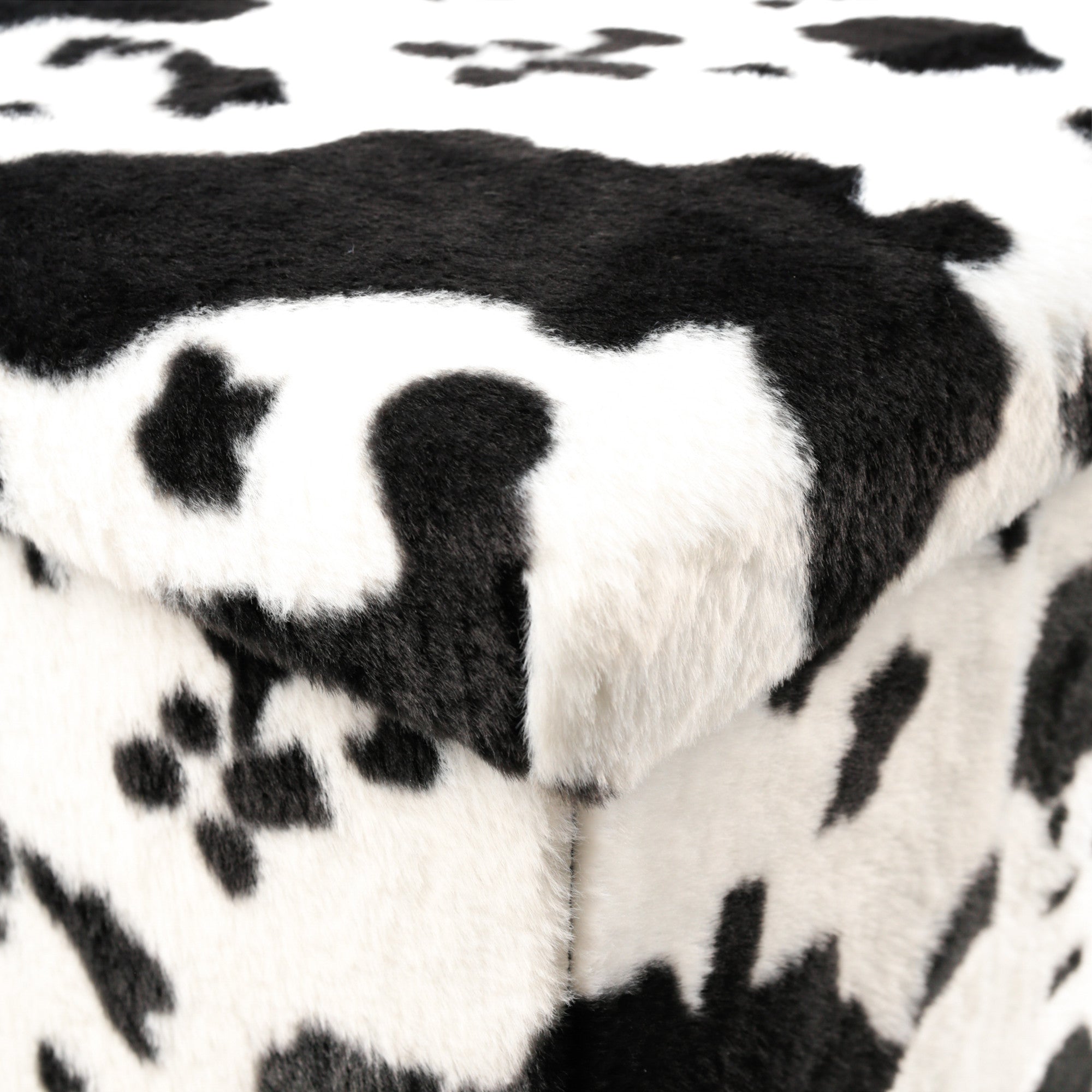 15" Black And White Faux Fur Cow Print Ottoman