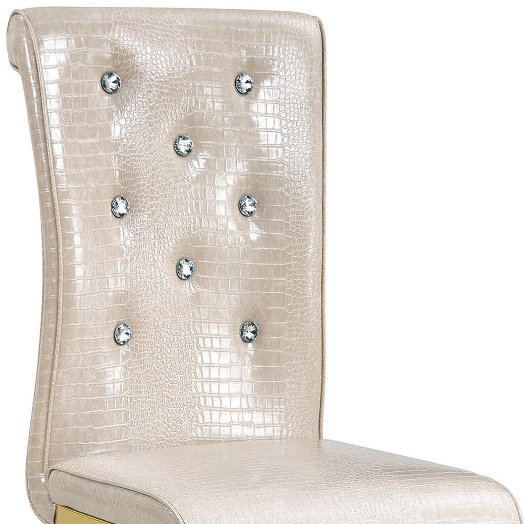 Set of Four Beige And Gold Tufted Faux Leather And Metal Dining Side Chairs