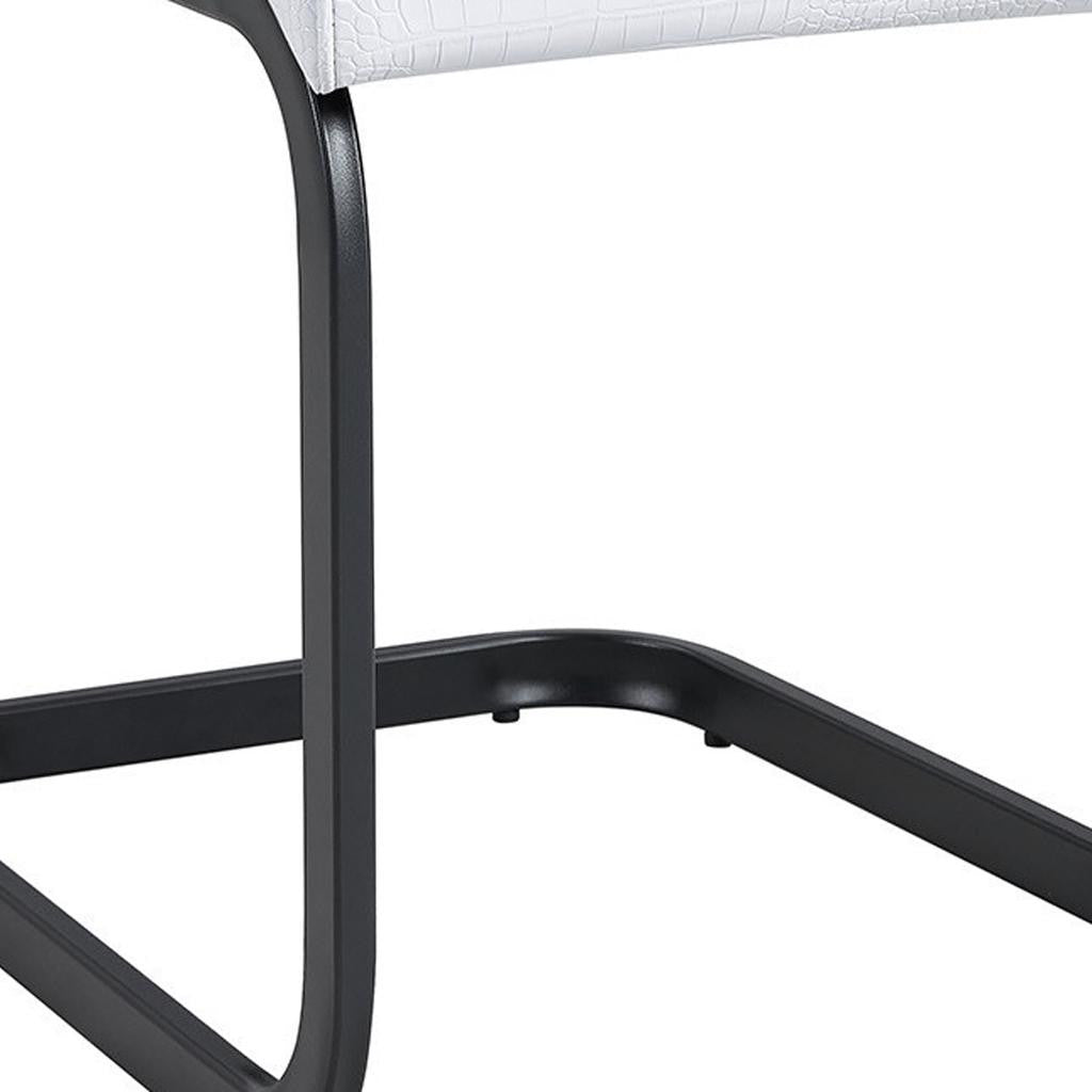 Set of Four White And Black Tufted Faux Leather And Metal Dining Side Chairs