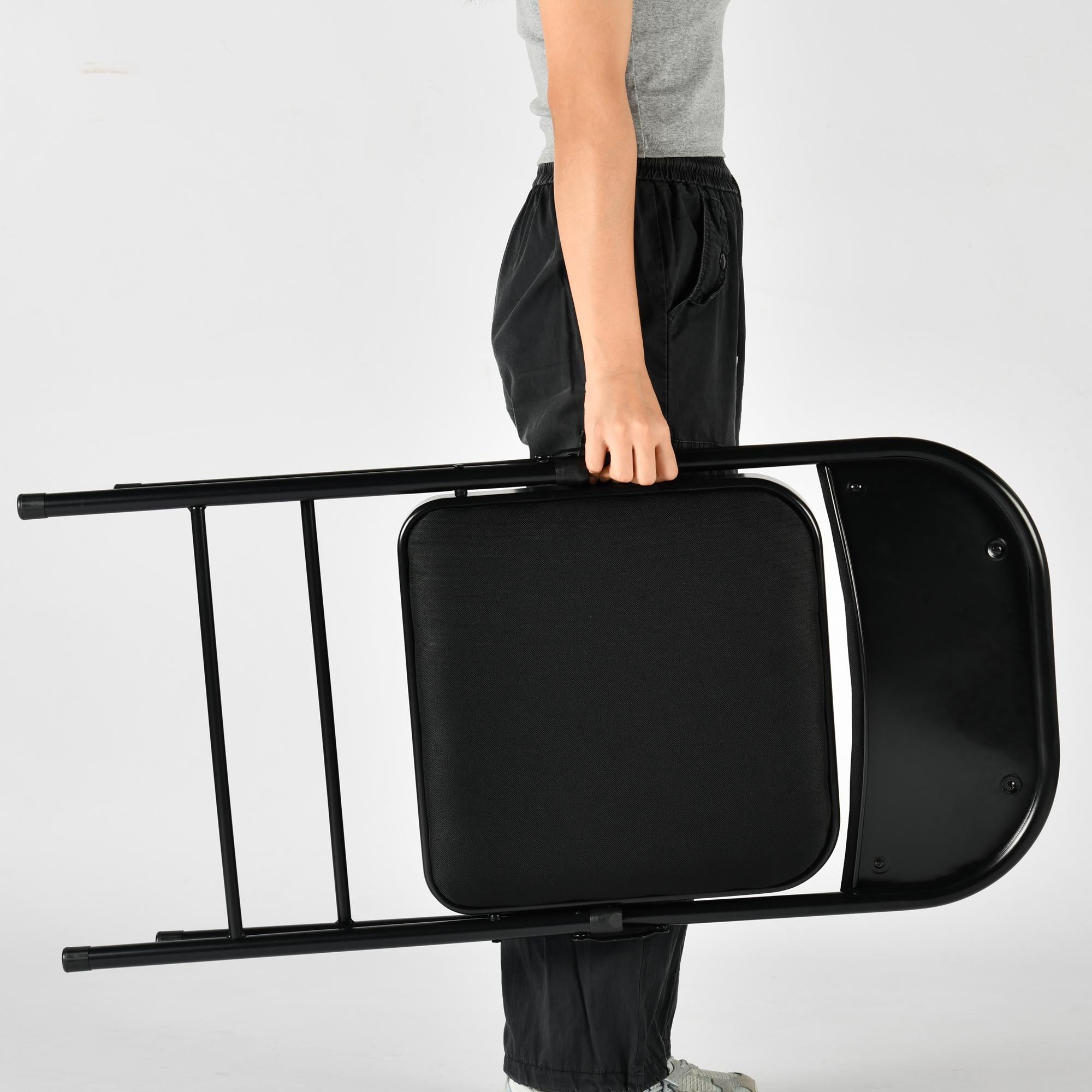 Set of Four Black Faux Leather and Steel Folding Chairs