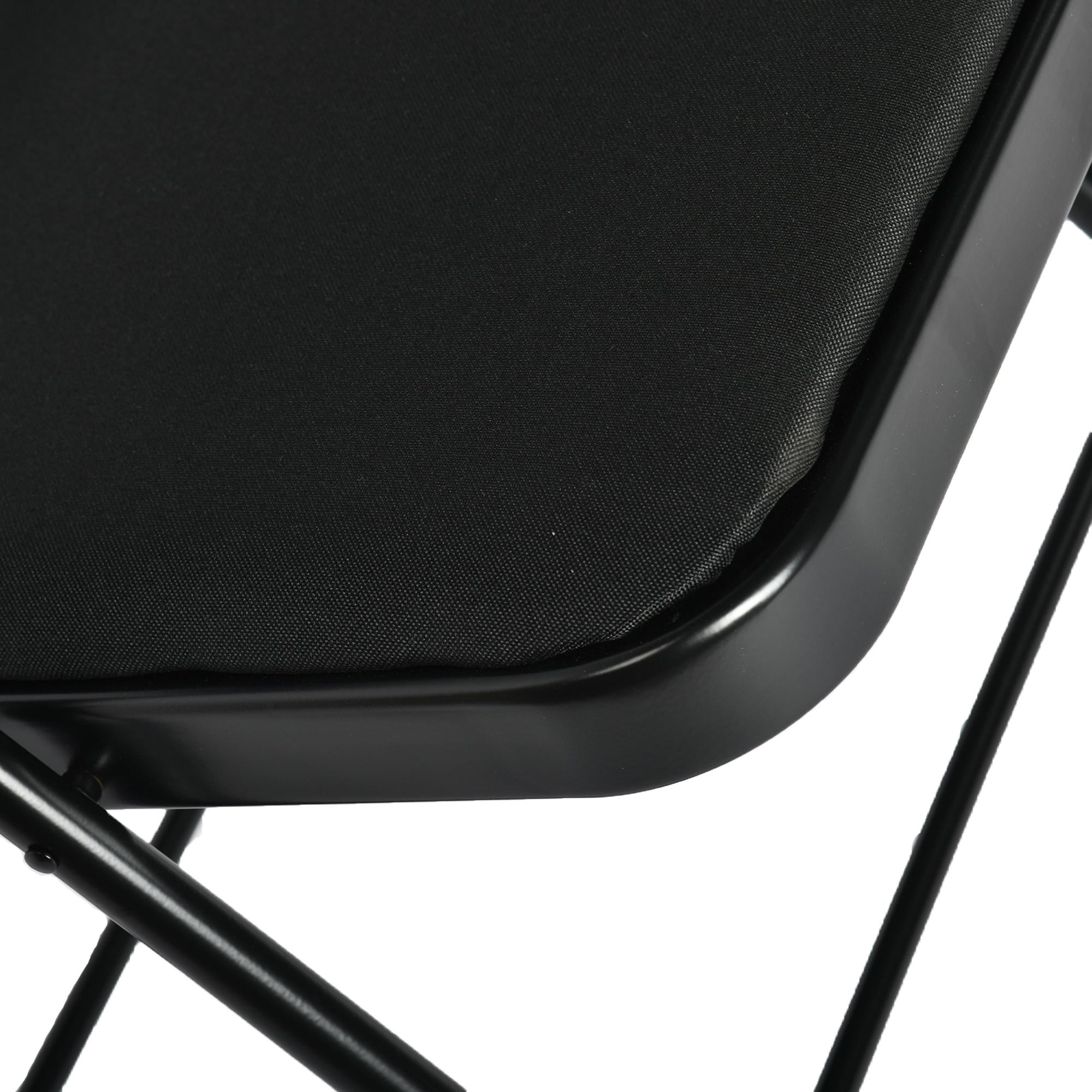 Set of Four Black Faux Leather and Steel Folding Chairs