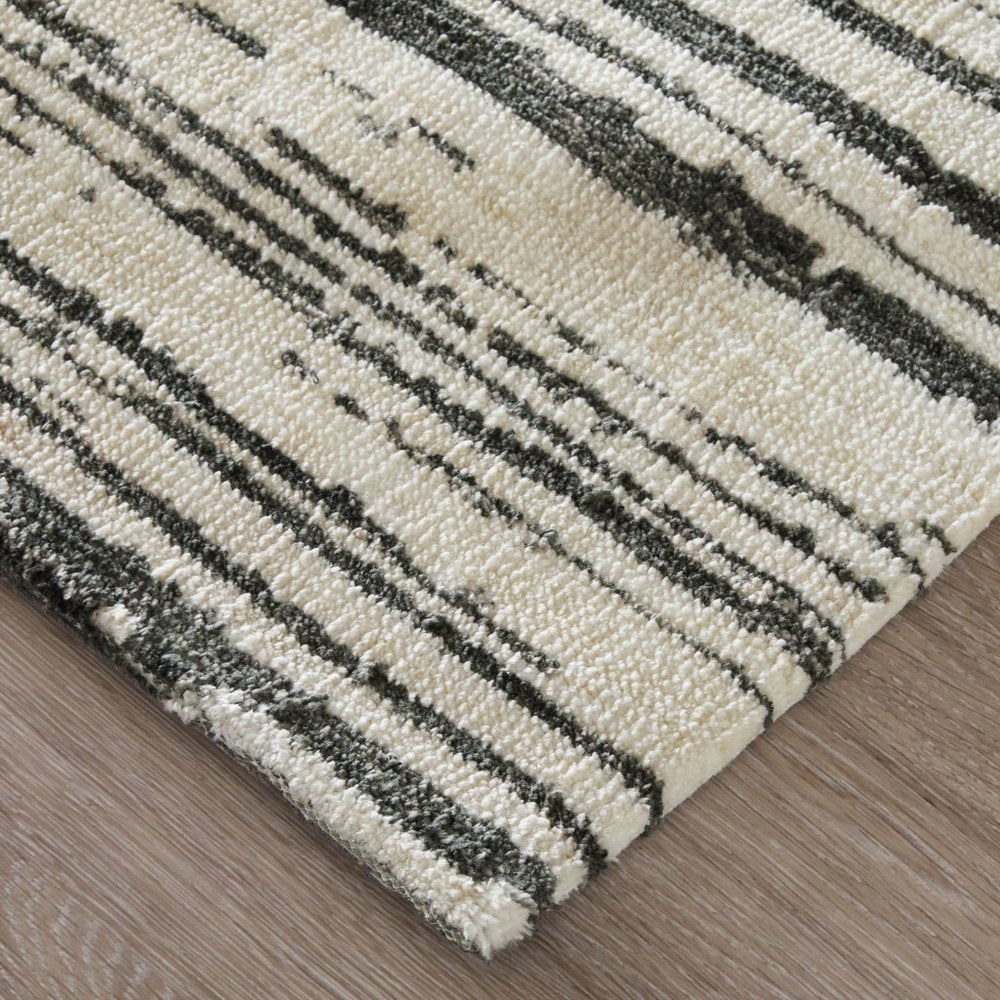 9' X 13' Black And Ivory Abstract Area Rug
