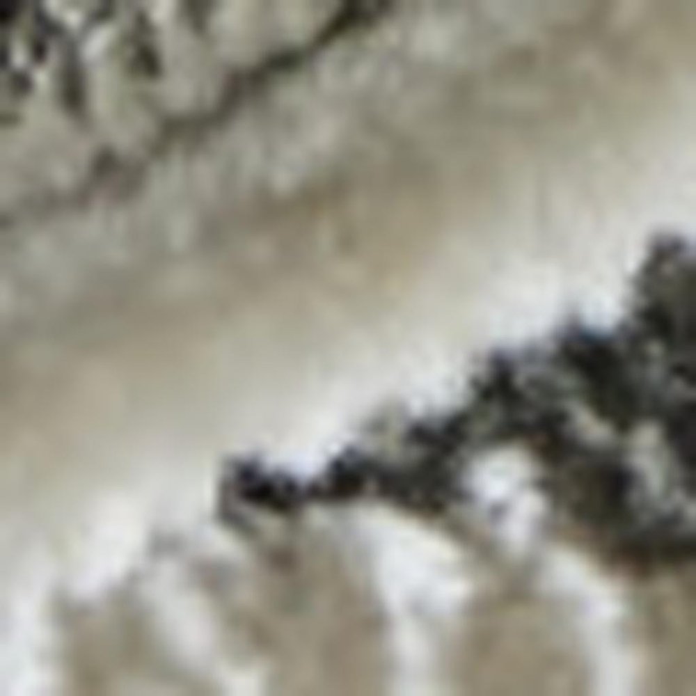 9' X 13' Black And Ivory Abstract Area Rug