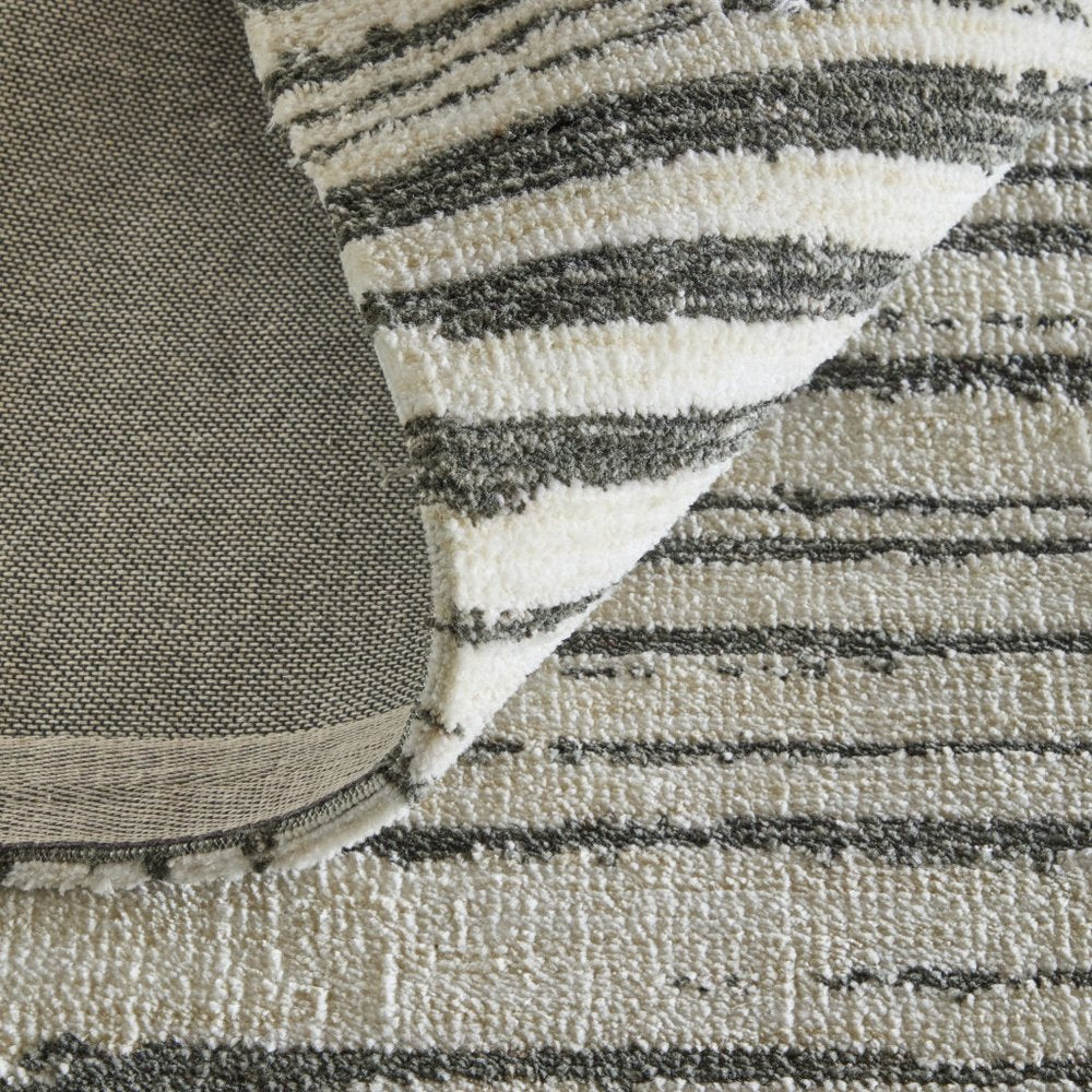 9' X 13' Black And Ivory Abstract Area Rug