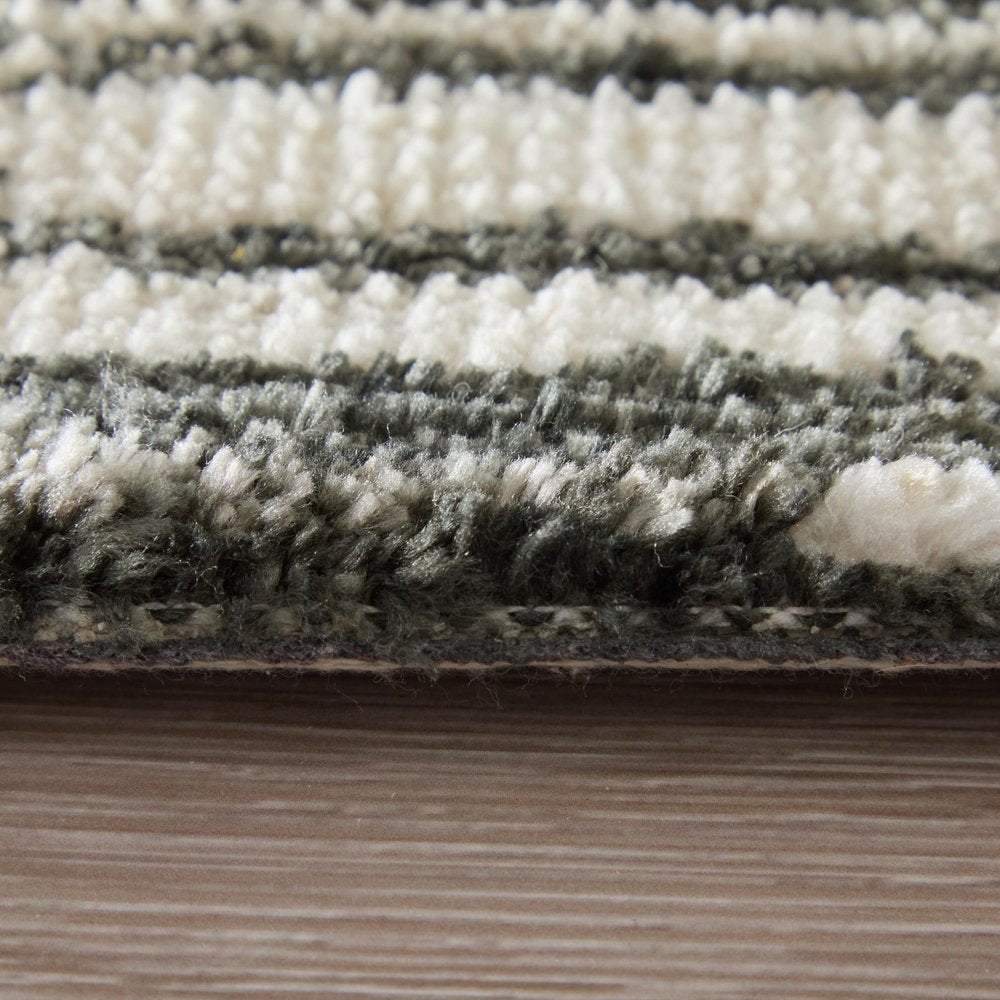 9' X 13' Black And Ivory Abstract Area Rug