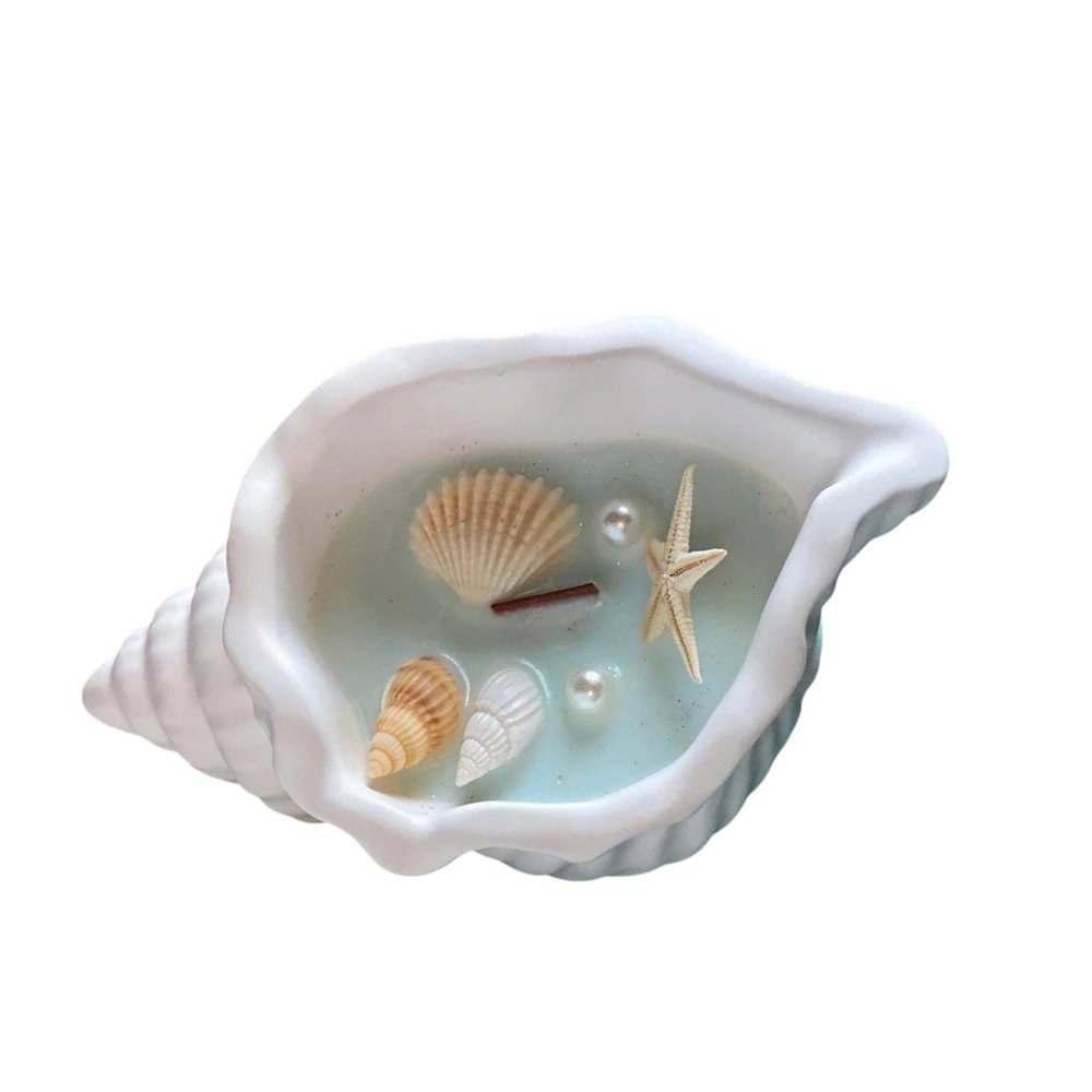 6" Light Blue Sea Salt And Orchid Scented Candle In White Resin Novelty Holder With Shells